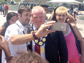 Mayor Rob Ford in Nathan Phillips Square Tuesday, July 22, 2014. (Don Peat/Toronto Sun)