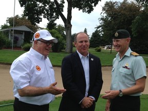 Forces & Families Open tournament director John Randolph (left), PGA Tour Canada president Jeff Monday and Col. Kevin Goheen, president of Hylands Golf Club, talk things over at yesterday’s media day for the Aug. 4-10 event. (Mike Shaw/Ottawa Sun)