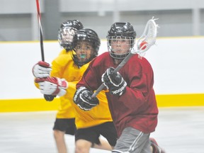 Action from the Junior Trojans lacrosse program July 22. (Kevin Hirschfield/The Graphic/QMI Agency)