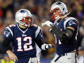 New England Patriots quarterback Tom Brady (12) congratulates tight end Rob Gronkowski (87) on scoring a touchdown during the second quarter against the Pittsburgh Steelers at Gillette Stadium last season. (Greg M. Cooper-USA TODAY Sports)