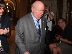 Senator Mike Duffy arrives at Parliament Hill in this June 4, 2013 file photo. (Andre Forget/QMI Agency)