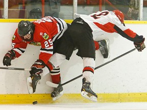 Picton D-man Nolan Powers takes out a Lakefield player during Schmalz Cup playoff action last season. This weekend, Pirates hold their prospects camp at the QSC. (QMI Agency photo)