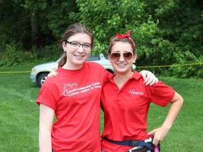 Abby Ouellette, left, and Cassandra Haggarty volunteered at the London Celebrates Canada event on Canada Day in Harris Park. Many activities went on during the day, capped by a fireworks display attended by some 40,000 people. (Submitted photo)