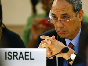 Israel's Ambassador to the U.N. Eviatar Manor pauses during the 21st Special Session of the Human Rights Council on the human rights situation in the Palestinian Territories at the United Nations Office in Geneva July 23, 2014. 

REUTERS/Denis Balibouse