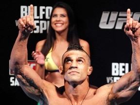 Brazil's UFC (Ultimate Fighting Championship) fighter Vitor Belfort gestures during an official weigh-in in Sao Paulo January 18, 2013. Belfort will face Michael Bisping of Britain on Saturday. (REUTERS/Nacho Doce)