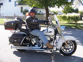 Arnold LePotvin's Harley-Davidson, shown here, was stolen from his apartment's parking garage on July 17. Sarnia police have arrested one suspect and are searching for a second. (Submitted photo)