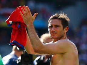 England's Frank Lampard applauds at the end of their 2014 World Cup Group D soccer match against Costa Rica at the Mineirao stadium in Belo Horizonte June 24, 2014.  (REUTERS)