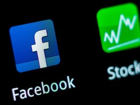 A Facebook application logo is pictured on a mobile phone in this file photo illustration taken in Lavigny May 16, 2012. REUTERS/Valentin Flauraud/Files