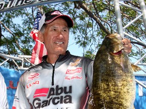 Professional angler Wayne Izumi brought in the biggest fish of the day, a 6.25-pound smallmouth bass, during the first day of competition Thursday at the Kingston Canadian Open Pro Bass championship.