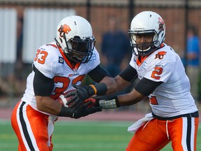 B.C. Lions running back Andrew Harris (left) has won three CFL player of the week awards recently (QMI Agency files)