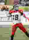 Calgary quarterback Bo Levi Mitchell (19) throws the ball during the first half of a CFL football game between the Edmonton Eskimos and the Calgary Stampeders at Commonwealth Stadium in Edmonton, Alta., on Thursday, July 24, 2014. Ian Kucerak/Edmonton Sun/QMI Agency