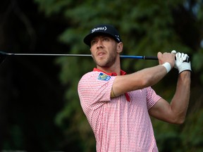 Graham DeLaet tees off the 10th hole during the second round of the RBC Canadian Open at Royal Montreal GC - Blue Course on Jul 25, 2014 in Ile Bizard, Quebec, CAN. (Eric Bolte/USA TODAY Sports)