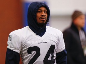 Seattle Seahawks running back Marshawn Lynch stands on sideline at their NFL Super Bowl XLVIII football practice in East Rutherford, New Jersey, January 30, 2014. (REUTERS/Shannon Stapleton)