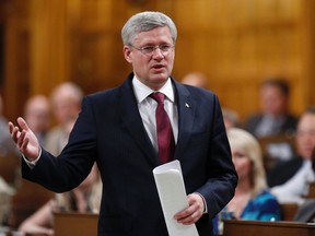 Prime Minister Stephen Harper speaks during Question Period in the House of Commons on Parliament Hill in Ottawa June 18, 2014. REUTERS/Chris Wattie