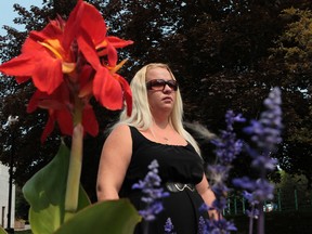 Tracy Gagne stands outside the Ottawa courthouse  Friday. Tracy's mother, Janet Clermont, ws killed by a drunk driver and she was attending the sentencing hearing. Tony Caldwell/Ottawa Sun