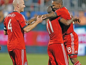 After signing Jermain Defoe (right) and Michael Bradley in the off-season, TFC is looking for its first post-season berth. (CRAIG ROBERTSON/Toronto Sun)
