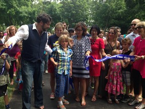 At the opening of the Jenna Morrison Reflexology Footpath in Durrefing Grove park on July 26, 2014. Left to right, Florian Schuck, Karent Stintz, Schuck and Morrison's son Lucas, Councillor Ana Bailao, Olivia Chow and , far right in a pink top, Morrison's mother Darlene Burke. (Angela Hennessy/Toronto Sun)