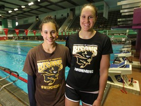 Swimmers Mackenzie Glover (right), and Kelsey Wog at the Pan Am Pool in Winnipeg.  Friday,  July 25, 2014.  Chris Procaylo/Winnipeg Sun/QMI Agency