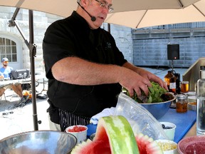 Popular Kingston chef Clark Day of the Aqua Terra Bistro conducts a Local Chef Cooking Demo at Springer Market Square on Saturday July 26 2014.  IAN MACALPINE/KINGSTON WHIG-STANDARD/QMI AGENCY