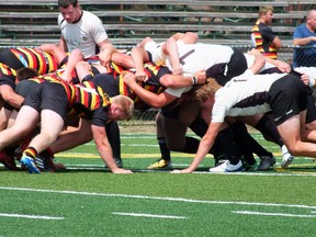 The Sarnia Saints battled with the Lindsay RFC on Sa​turday before walking off the field with a win over the league's top team. BRENT BOLES / THE OBSERVER / QMI AGENCY