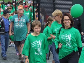 HAROLD CARMICHAEL/The Sudbury Star
Participants in Sunday's Irish Heritage Club of Sudbury Michael O'Reilly Walk for a Second Chance head out from Bell Park to start their awareness walk.