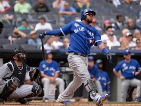 Blue Jays’ Juan Francisco belts a fifth inning home run yesterday at Yankee Stadium. (USA TODAY SPORTS)