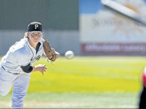 Edmonton Prospects pitcher Curtis Taylor tosses against the Swift Current Indians at Telus Field on Sunday, June 22. (Ian Kucerak/Edmonton Sun)