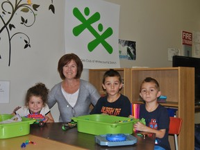 From left: Kaylee,5, Charles, 7, and Dillan, 5, Whitecourt and District Boys and Girls Club Executive Director Cathy Branton poses with some of the children taking part in one of the club’s summer day camps on Monday, July 21.
Barry Kerton | Whitecourt Star