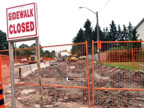 Construction continues on Hyde Park Road July 24, 2014 in London, Ont. Road work, like the $22-million Hyde Park Road project, crisscrosses the entire city map and totals about $80 million this summer. CHRIS MONTANINI\LONDONER\QMI AGENCY