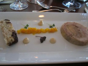 Foie gras appetizer, wrapped in guinea fowl meat, with chutney and crostini.