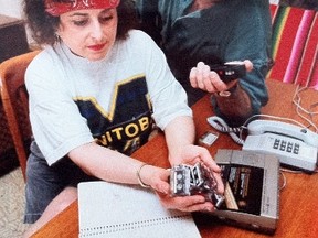 Natalie Pollock, seen here in this 1992 file photo with her brother Ron, is suing the City of Winnipeg, claiming a crack in a city sidewalk caused her to fall and break her wrist. (FILE PHOTO)