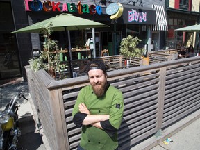 Justin Wolff, owner of The Early Bird restaurant on Talbot St. downtown, spent $10,000 to build a patio in two parking spots. He pays the city $1,200 per spot, but it?s worth it, he says. (DEREK RUTTAN, The London Free Press)