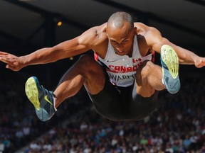 Canada's Damian Warner competes in the Men's Decathlon Long Jump at the 2014 Commonwealth Games in Glasgow, Scotland, July 28, 2014.  (REUTERS)