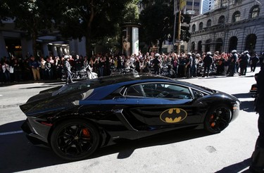 The Batmobile carrying five-year-old leukemia survivor Miles Scott, aka "Batkid" is seen as part of a day arranged by the Make- A - Wish Foundation in San Francisco, California November 15, 2013. The young cancer survivor was treated to various super hero scenarios including receiving a commendation at San Francisco City Hall.     REUTERS/Stephen Lam