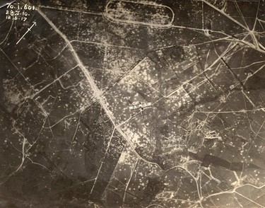 An aerial photograph shows an allied aircraft flying over the Western Front in this undated handout picture. This picture is part of a previously unpublished set of World War One (WWI) images from a private collection. The pictures offer an unusual view of varied and contrasting aspects of the conflict, from high tech artillery to mobile pigeon lofts, and from officers partying in their headquarters to the grim reality of life and death in the trenches. The year 2014 marks the centenary of the start of the war.  REUTERS/Archive of Modern Conflict London/Handout via Reuters