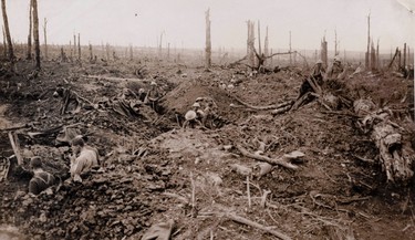 British troops are pictured in trenches on the devastated battlefield during the battle of the Somme in this 1916 handout picture. This picture is part of a previously unpublished set of World War One (WWI) images from a private collection. The pictures offer an unusual view of varied and contrasting aspects of the conflict, from high tech artillery to mobile pigeon lofts, and from officers partying in their headquarters to the grim reality of life and death in the trenches. The year 2014 marks the centenary of the start of the war.  REUTERS/Archive of Modern Conflict London/Handout via Reuters