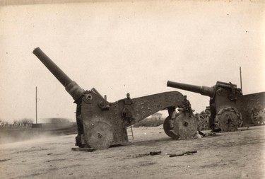 Italian heavy artillery guns are pictured on the Italian Front in this 1918 handout picture. This picture is part of a previously unpublished set of World War One (WWI) images from a private collection. The pictures offer an unusual view of varied and contrasting aspects of the conflict, from high tech artillery to mobile pigeon lofts, and from officers partying in their headquarters to the grim reality of life and death in the trenches. The year 2014 marks the centenary of the start of the war.  REUTERS/Archive of Modern Conflict London/Handout via Reueters