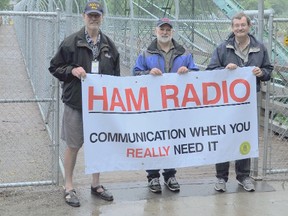 London Amateur Radio Club members (left-right) Mike Watts, Jim Morris and Tom Pillon gather at the Blackfriars Bridge in London as part of Historical Bridges On The Air event.