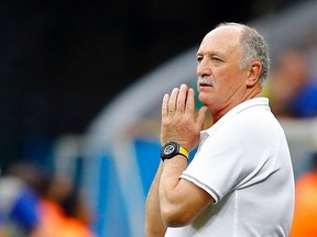 Brazil's coach Luiz Felipe Scolari reacts during their 2014 World Cup third-place playoff against the Netherlands at the Brasilia national stadium in Brasilia in this July 12, 2014 file photo. (REUTERS/Dominic Ebenbichler/Files)