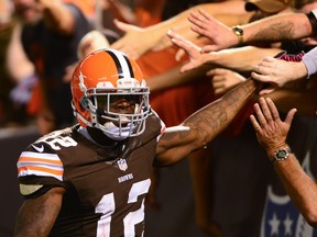 Cleveland Browns wide receiver Josh Gordon (12) celebrates with fans after catching a pass for a touchdown during the third quarter against the Buffalo Bills at FirstEnergy Stadium on Oct 3, 2013 in Cleveland, OH, USA. (Andrew Weber/USA TODAY Sports)