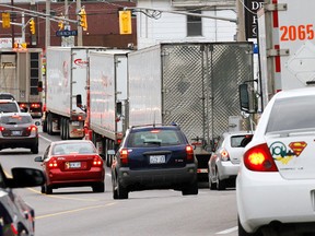 Heavy detour traffic on Dundas Street East, in the area of Church Street, in Belleville, Ont. after the westbound lane on Highway 401between Marysville Road and Highway 37 in Belleville was closed due to a fatal three-vehicle collision Tuesday afternoon, July 29, 2014.  - Jerome Lessard/The Intelligencer/QMI Agency