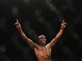 Brazil's Ultimate Fighting Championship (UFC) fighter Anderson Silva celebrates after defeating Japan's Yushin Okami during the UFC Rio, a professional mixed martial arts (MMA) competition in Rio de Janeiro August 27, 2011. (REUTERS/Ricardo Moraes)