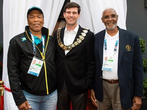 Edmonton mayor Don Iveson is flanked by Wellington Miller of Bahamas, left, and Kenn Banks of Anguilla at the Mayors' Reception in Glasgow on Tuesday (Lenny Warren, Warren Media).