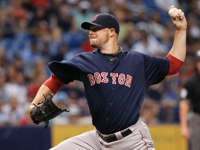 Boston Red Sox starting pitcher Jon Lester (31) throws a pitch during the second inning against the Tampa Bay Rays at Tropicana Field on Jul 25, 2014 in St. Petersburg, FL, USA. (Kim Klement/USA TODAY Sports)