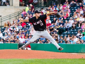 Wichita Wingnuts pitcher Jason Van Skike throws a pitch as a member of Team South as he competes at the 2014 American Association All-Star Game at Shaw Park in Winnipeg, Man., on Tues., July 29, 2014. (Brook Jones/QMI Agency)