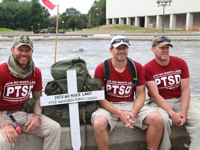 Steve Hartwig, left, Jason McKenzie and Scott McFarlane are marching across Canada to raise awareness about PTSD. The men stopped in Sudbury, ON. on Tuesday, July 29, 2014.
JOHN LAPPA/THE SUDBURY STAR/QMI AGENCY