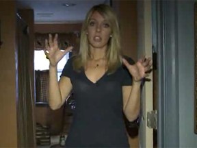 Fox reporter Katie Kyros inside a home that is allegedly haunted. (Fox43 screengrab)