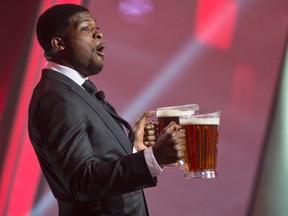 PK Subban brings beer on stag at the "Hilarity for Charity" gala hosted by Seth Rogen's at the Just for Laughs Festival in Montreal July 26, 2014. (JOEL LEMAY/QMI AGENCY)