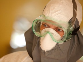 Dr. Kent Brantly wears protective gear at the case management center on the campus of ELWA Hospital in Monrovia, Liberia in this undated handout photograph courtesy of Samaritan's Purse. Brantly, one of two Americans who tested positive for the virus, has been described as stable but suffering from some symptoms of the contagious disease, for which there is no known cure. (REUTERS/Samaritan's Purse/Handout via Reuters)