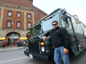 Tom Antonarakis with his food truck "Busters Sea Cove" out front of St Lawrence Market in Toronto on Wednesday, July 30, 2014. The first Food Truck Festival will be happening this weekend at Woodbine Park and will be raising money for Sick Kids. (Dave Abel/Toronto Sun)